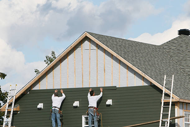 Professional Siding Installation technician working in Dalton, PA